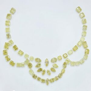 Fancy yellow diamond necklace layout worn as bespoke high jewellery
